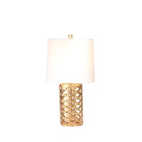 Enlighten your home setting with the inclusion of this metal table lamp featuring contemporary style Depicting round shaped silhouette it has open design diamond base in golden hue which adds to the appeal of the lamp Fabric drum shade completes the look 