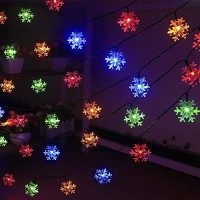 Xingpold Solar Christmas Snowflake String Lights Outdoor Waterproof Solar Powered Christmas Fairy Lights 30Ft 50 Led 8 Modes Solar Snowflake Lights For Christmas Tree Garden Patio Decor (Multicolor)