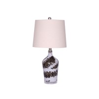 Brighten up your home with the inclusion of this table lamp featuring contemporary style The glass bottle base shade with painted abstract pattern in black hue adds to the overall look of the piece Fabric tapered shade completes the design of the piece an