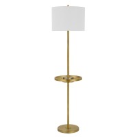 Light a seating area or entertainment room with this stylish antique brass floor lamp It features a smooth polished finish circular tray table and two usb ports This lamp ships complete with a white drum shade and matching finial