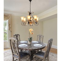 The Regallo Chandelier is a 275 Diameter X 23 Tall It features 6 arms with frosted Tulip shaped glass shades The chandelier is UL Listed and uses 6 25 watt E2627 standard socket bulbs Chandelier comes fully assembled in box The chandelier is made in Iron 