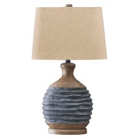 Illuminate your bedroom decor setting by bringing in this contemporary style inspired Table Lamp which comes with fabric shade and rests on textured paper composite base Incorporated with a 3 way switch it is accented in the hues of beige and gray