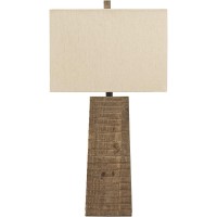 Illuminate your bedroom decor setting by bringing in this transitional style inspired Table Lamp which comes with fabric shade and rests on wooden base Incorporated with a 3 way switch it is accented in the hue of brown