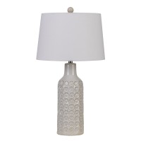 Emblaze your existing decor setting by bringing in this contemporary style Table Lamp which comes with a 3 way rotary switch and is wrapped with a linen hardback shade Supported on a floral engraved ceramic base it will be a perfect addition to your home