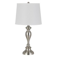 Oozing of elegance and glamorous appeal this table lamp available in set of 2 depicts perfection in its purest form The turned style body accented in silver color hue makes it appear charming and a stand alone addition The faux silk fabric shade adds rega