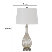 The beautiful table lamp available in set of 2 will bring the most desired addition in the bedroom interior The clear hue of this piece can blend well with any interior setting The bowling pin design body embellished with crackle finish and textured lines