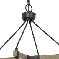 Design and decorate your ceiling with a classic piece of art this elegant Chandelier will enhance and set a relaxing atmosphere in your room It features a metal hanging frame and crossbar support with 4 glass shields and light fixtures which requires 4 Ed