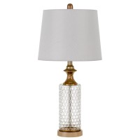 Bring the most enchanting look in the interior setting of the home with the inclusion of this table lamp available in set of 2 The circular shaped body with embossed honeycomb pattern adds a tint of glam and touch to it The contrasting golden hue brings t