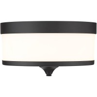 This stylish modern threelight flushmount ceiling light from the Cosmopolitan collection offers a touch of Art Deco flavor adding simplicity with a twist to a kitchen dining space or bedroom An etched milk white shade is trimmed with bold matte black fini