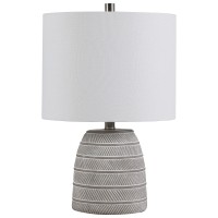 Bringing in a very traditional vibe this table lamp is here to embellish your entire setup with a whimsical appeal The bellied shaped body is accented with carved lines which gives it a tint of creativity 3 way socket switch and E26 bulb base allows it to