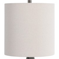 This elegant piece of table lamp is here to brighten up the entire setting and fill the room with an aesthetic appeal Crafted from ceramic the pot bellied shape body with diamond pattern adds to the creativity of the piece 3 way socket switch and E 26 bul