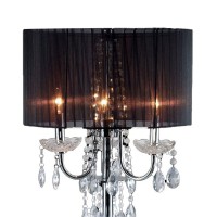 Contemporary in style and design this table lamp is here to bring an additional whimsical appeal It features a tubular metal support with eye catching hanging crystal droplets creating the most ravishing appeal for the lamp This elegant lamp is topped wit