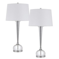 Revamp your interior with the introduction of this stylish Table Lamp available in a set of 2 Incorporated with crystal accent on chrome accented metal base it is wrapped with a white tone hardback fabric shade