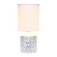 Spruce up the lighting in your home with this fashionably designed table lamp A beautiful repeat pattern printed on the base is paired effortlessly with a clean white fabric shade With a variety of color and print options available you are bound to find t