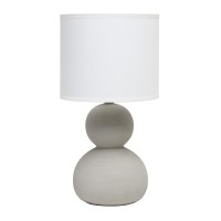 With two ceramic stones vertically nested atop one another this lamp stands at just under 16 in height A beautiful fabric drum shade completes this modern look This is the perfect accent piece to illuminate your space of choice