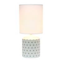 Spruce up the lighting in your home with this fashionably designed table lamp A beautiful repeat pattern printed on the base is paired effortlessly with a clean white fabric shade With a variety of color and print options available you are bound to find t