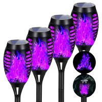 Aounq Solar Lights Outdoor Waterproof Purple Halloween Decorations Upgraded 4 Pack Solar Torches With Flickering Flame Waterpro