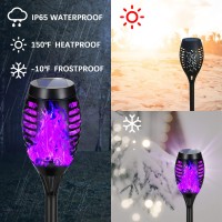 Aounq Solar Lights Outdoor Waterproof Purple Halloween Decorations Upgraded 4 Pack Solar Torches With Flickering Flame Waterpro