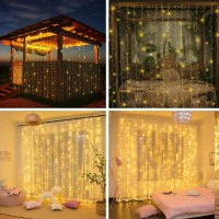 Xinxianlian 300Led Solar Curtain Lights Outdoor Indoor 8 Modes Solar Fairy Curtain String Lights Waterproof Twinkle Lights For Home Garden Patio Gazebo(Warm White)