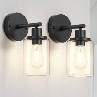 Wall sconces set of two is crafted from high quality metal features with a matte black finish sturdy base and thick clear glass shade which adds a sense of elegance and releases bringt soft light effect to create a warm lighting atmosphere inside your roo