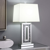 Glimmering dark crystallike accents emerge from the base interior of this stunning contemporary table lamp A narrow base outlined in mirror tile accents the edges creating a beveled look Mirror tiles also line the flush base further lending to the reflect