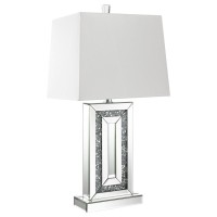 Glimmering dark crystallike accents emerge from the base interior of this stunning contemporary table lamp A narrow base outlined in mirror tile accents the edges creating a beveled look Mirror tiles also line the flush base further lending to the reflect