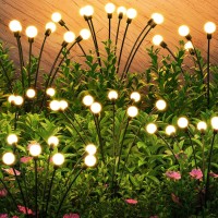 E-Kong Solar Garden Lights, 4 Pack 32 Led Solar Lights Outdoor Waterproof, Bright Warm White Solar Powered Firefly Lights, Wind Dance Solar Lights For Outside Backyard Walkway Halloween Decoration