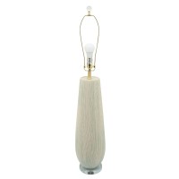 With a natural and comforting aesthetic this table lamp is a calm addition to your interior design The elongated rounded body with textured lines adds a finesse and creative look to it The elongated fabric drum shade filters light for a pleasant glow Sold