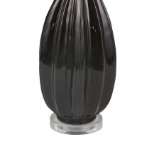 Introduce a dash of elegance and creativity to your living room or bedrooms with this table lamp With a bowling pin shape in the body and textured faceted vertical lines this artistic piece includes a tapered fabric shade that comes together to create a p