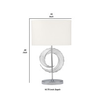 Revamp the aesthetics of your living space with this intriguing and artisinal table lamp The spiral design in the body of this piece is eye catching and elegant in style The open design makes this piece complement your other decor as it makes a confident 