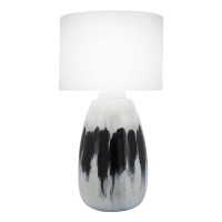 Elegant and artfully crafted this table lamp is a versatile statement piece for any bedroom living room or family space The subtly vase shaped base with a dual tone black and white painted finish give this piece uniqueness and class it will certainly be y