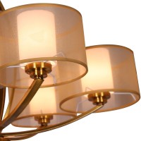 Give your living room area a warm glow with this chandelier Showcasing attractive and tight shallow curves from the center to the arms the design is completed by the translucent fabric shade that give this homemaking piece a wholesome and friendly look Th