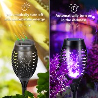 Toodour Purple Solar Halloween Lights Outdoor 12 Pack Solar Torch Lights With Flickering Flame Waterproof Outdoor Yard Decorat