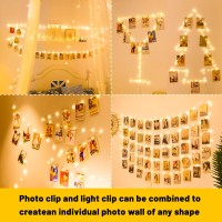 Hxweiye 50Leds Photo String Light Warm White 164Ft Battery Powered Fairy Light With 52 Clear Clips 10 Hooks On Wall For Hang