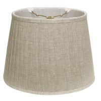 This 16 Cream Slanted Oval Paperback Linen Lampshade has a hint of traditional flair and will be a great addition to your lamp base This slant oval side pleat softback lampshade includes a standard washer fitter that fits over a standard harp and can be u