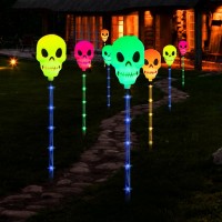 Aovciust Halloween Decorations Outdoor 4Set Solar Pathways Lights With Multicolor Waterproof Skull Lights For Halloween Decora